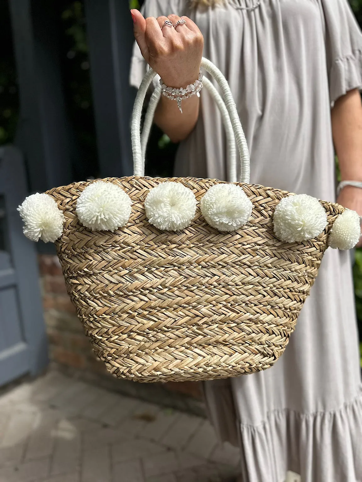 White Pom Pom Weaved Straw Bag