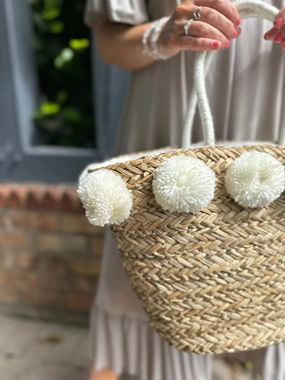 White Pom Pom Weaved Straw Bag